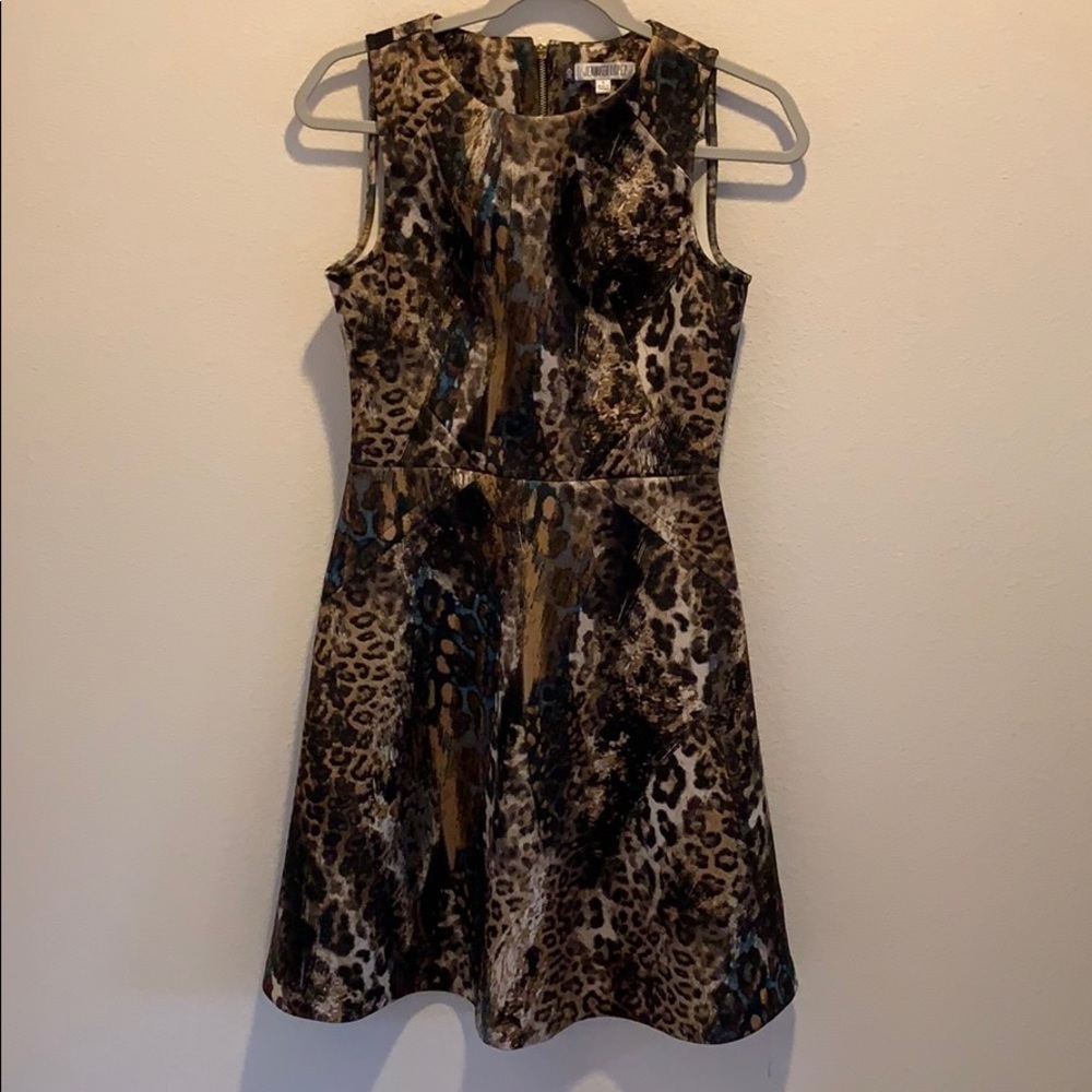 Jennifer Lopez Animal Print fit and flair. Size 4.​​​​​​​​​​​​​​​​​​​​​​